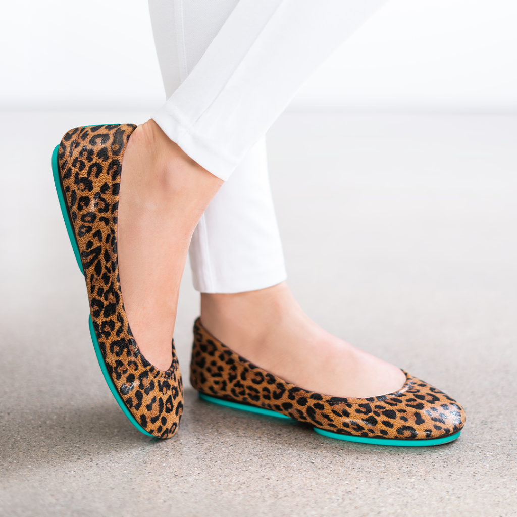Seasonal Lookbook: 12 Outfits with One Pair of Tieks leopard print tieks ballet flats with white pants.jpg