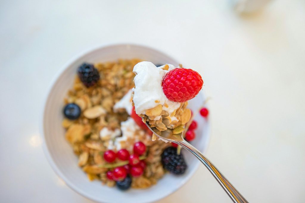 Healthy Diet Tips That Support Wellness During Chemotherapy Delicious breakfast bowl with yogurt, granola, and fresh berries for a healthy start.