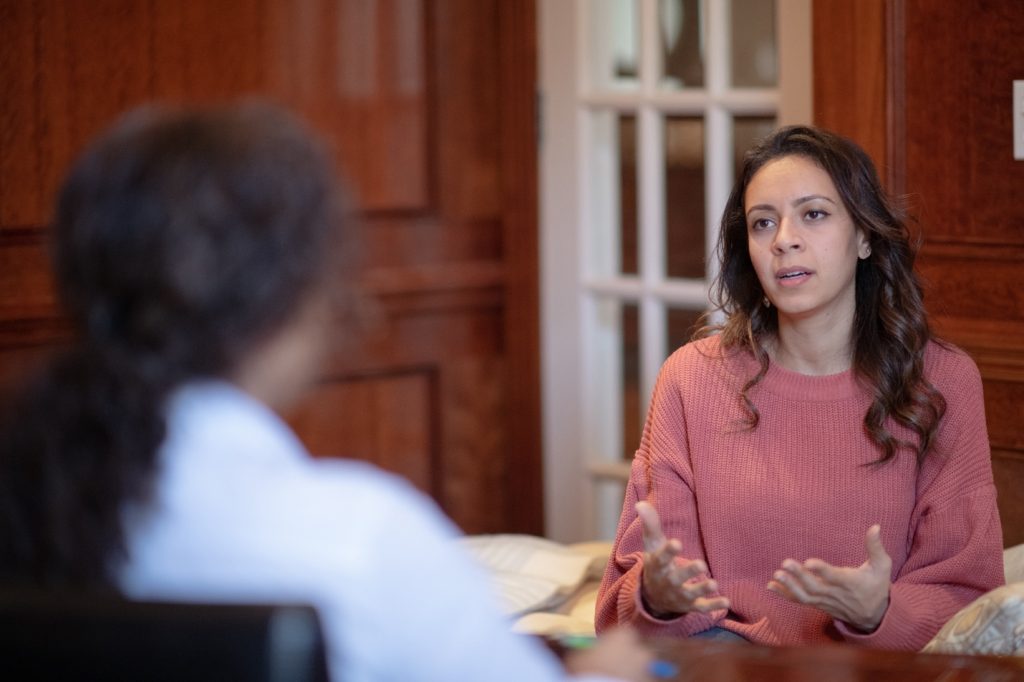 Woman talking with a counsellor about her physical and emotional health